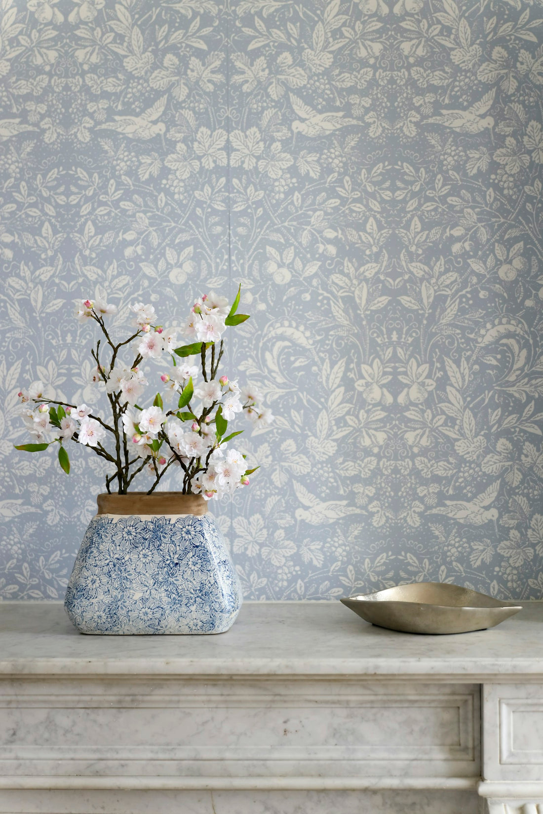 Ceramic vase with fresh-cut flowers
